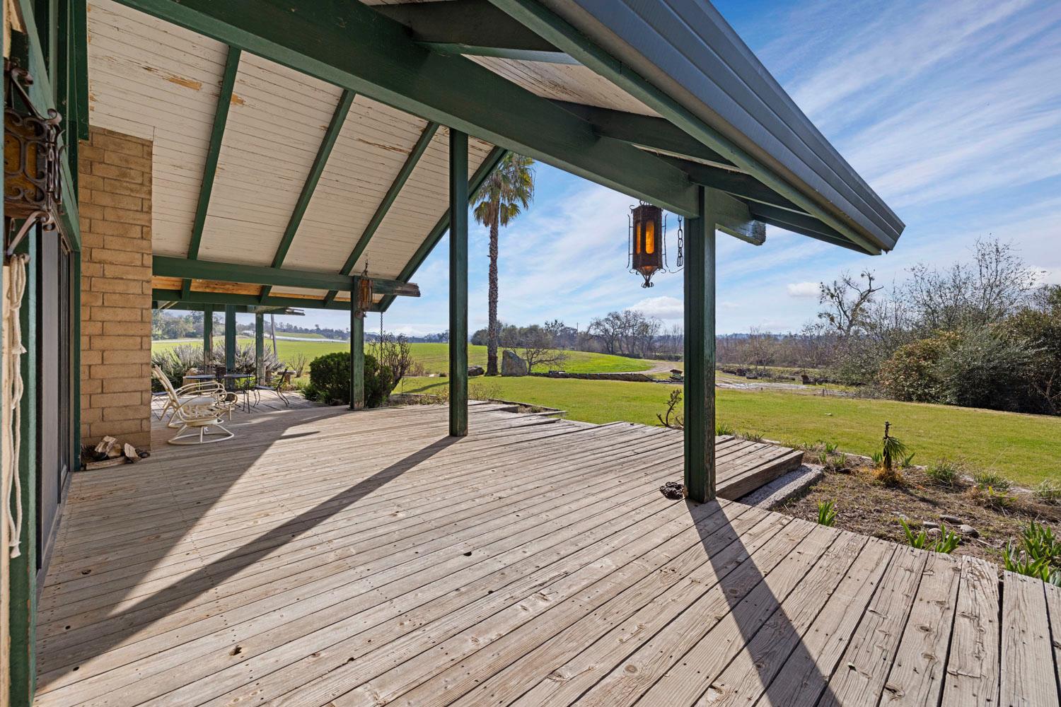 3270 Jackson Valley Road Ione, CA 95640 - Photo 6 of 34 a view of swimming pool with garden and patio