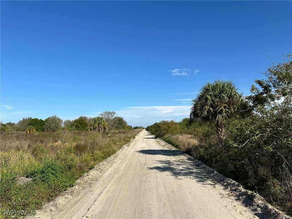 2nd Road LaBelle, FL 33935 - Photo 8 of 9 a view of a lake with a mountain