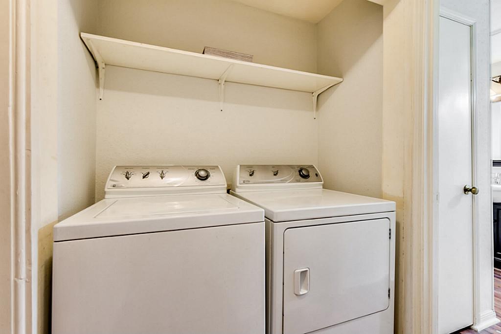 2100 Tanglewilde Street, Unit 296 Houston, TX 77063 - Photo 13 of 31 a utility room with dryer and washer