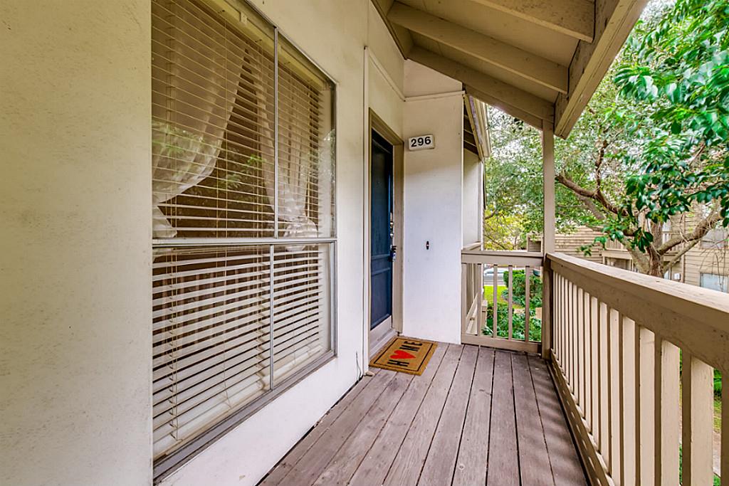 2100 Tanglewilde Street, Unit 296 Houston, TX 77063 - Photo 21 of 31 a view of balcony with wooden floor