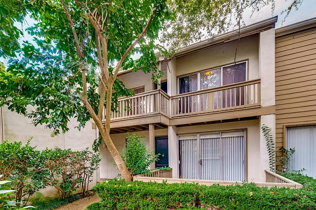 2100 Tanglewilde Street, Unit 296 Houston, TX 77063 - Photo 24 of 31 front view of a house with a tree