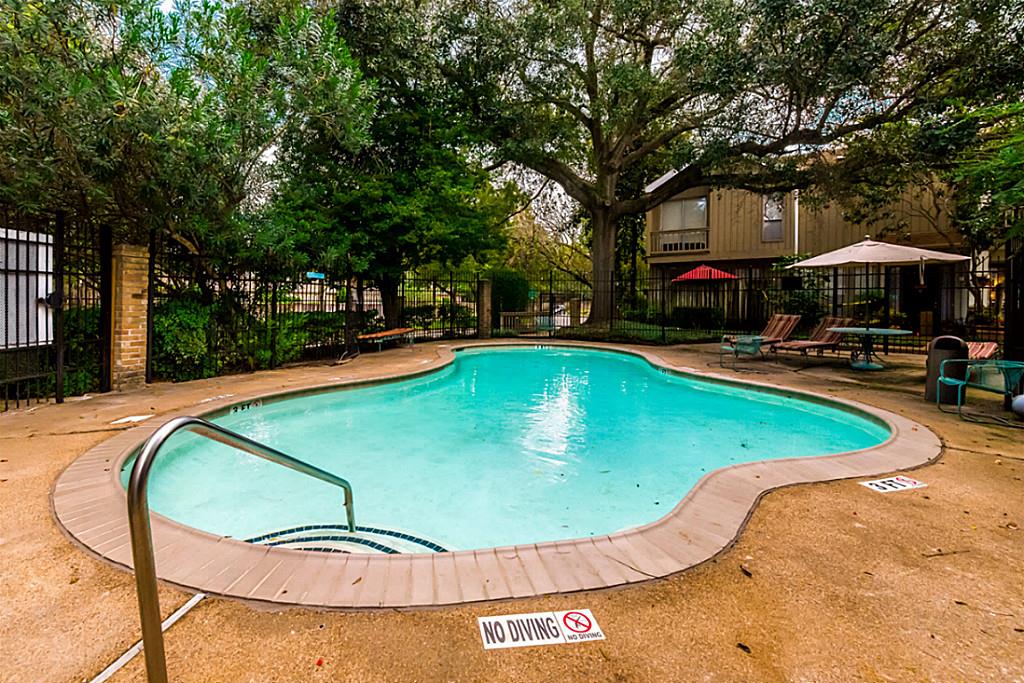 2100 Tanglewilde Street, Unit 296 Houston, TX 77063 - Photo 28 of 31 a view of a swimming pool with a patio