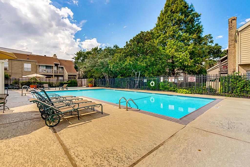 2100 Tanglewilde Street, Unit 296 Houston, TX 77063 - Photo 29 of 31 a view of swimming pool with chairs