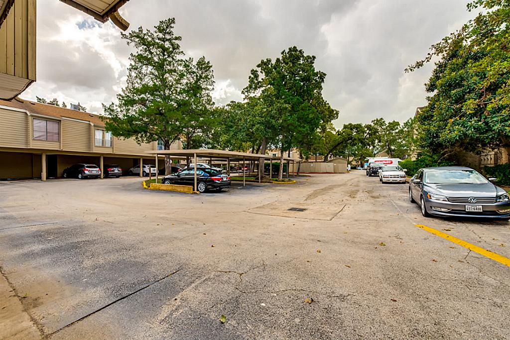 2100 Tanglewilde Street, Unit 296 Houston, TX 77063 - Photo 31 of 31 a view of a street with cars