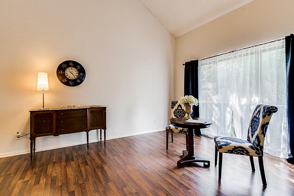 2100 Tanglewilde Street, Unit 296 Houston, TX 77063 - Photo 6 of 31 a view of a workspace with furniture and wooden floor