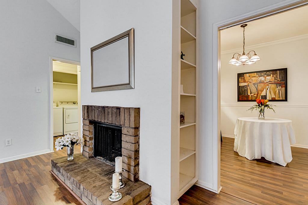 2100 Tanglewilde Street, Unit 296 Houston, TX 77063 - Photo 7 of 31 a living room with furniture and a fireplace