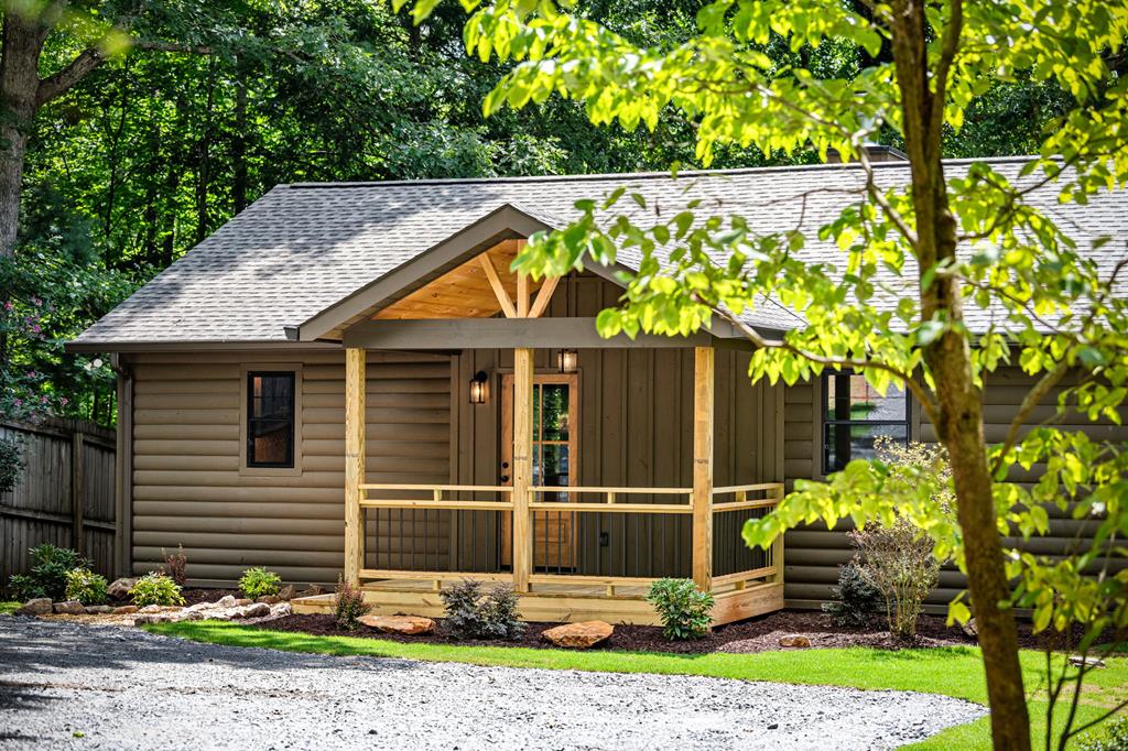 a backyard of a house with lots of green space