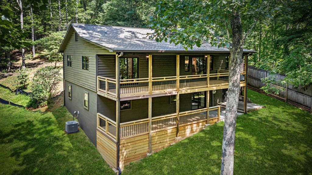 570 Cabin Trail Blue Ridge, GA 30513 - Photo 11 of 53 a view of a house with backyard and porch