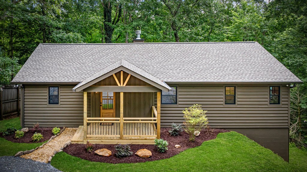 570 Cabin Trail Blue Ridge, GA 30513 - Photo 4 of 53 a house view with a garden space