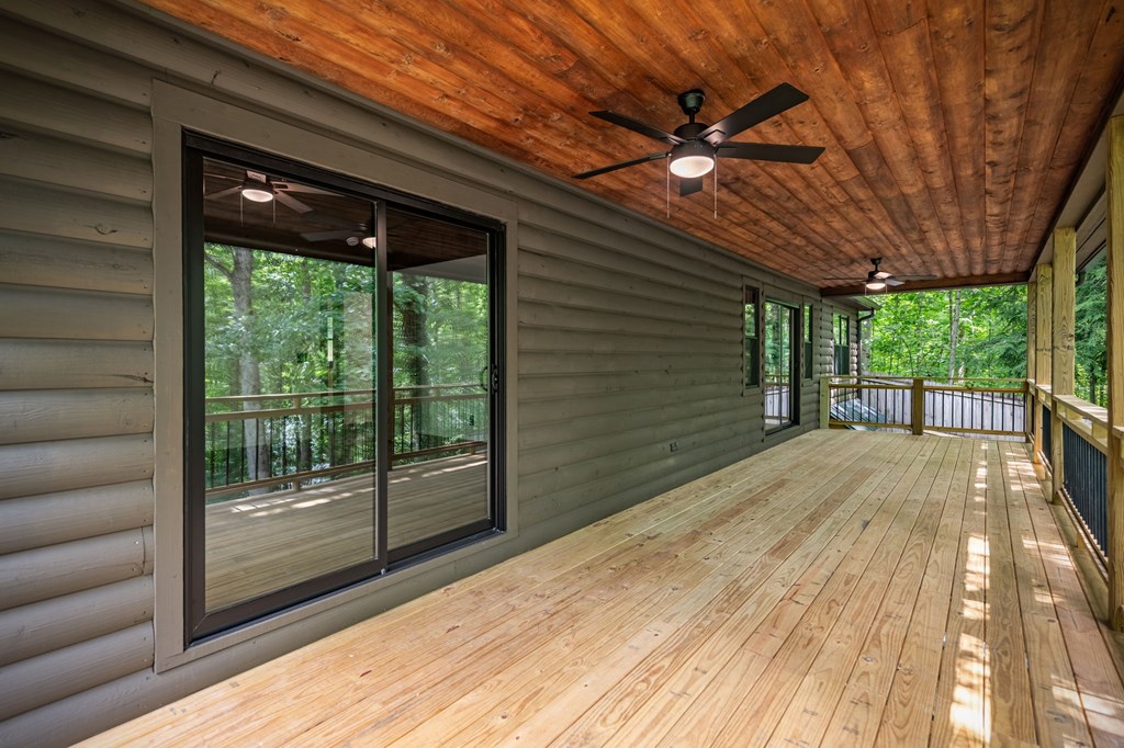 570 Cabin Trail Blue Ridge, GA 30513 - Photo 43 of 53 a view of a backyard of a house with a large tree