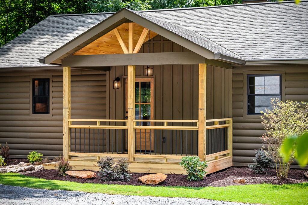 570 Cabin Trail Blue Ridge, GA 30513 - Photo 7 of 53 a view of house with backyard outdoor seating and entertaining space