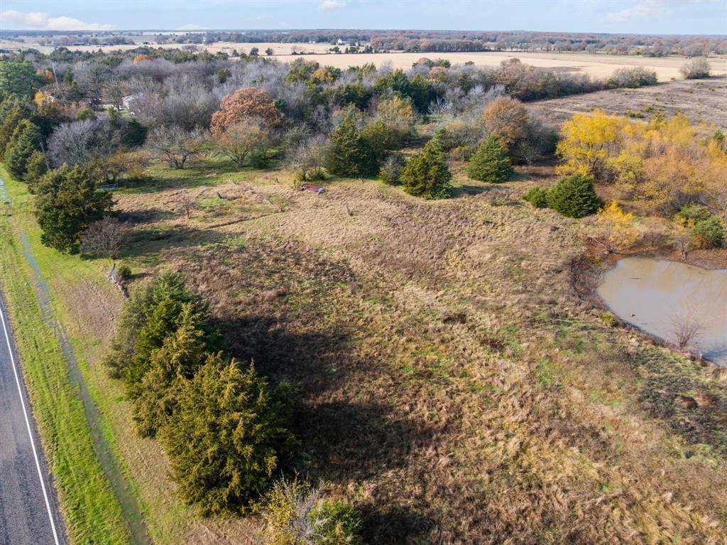 3600 East Fm 1396 Ivanhoe, TX 75447 - Photo 18 of 37 a view of a yard with wooden fence