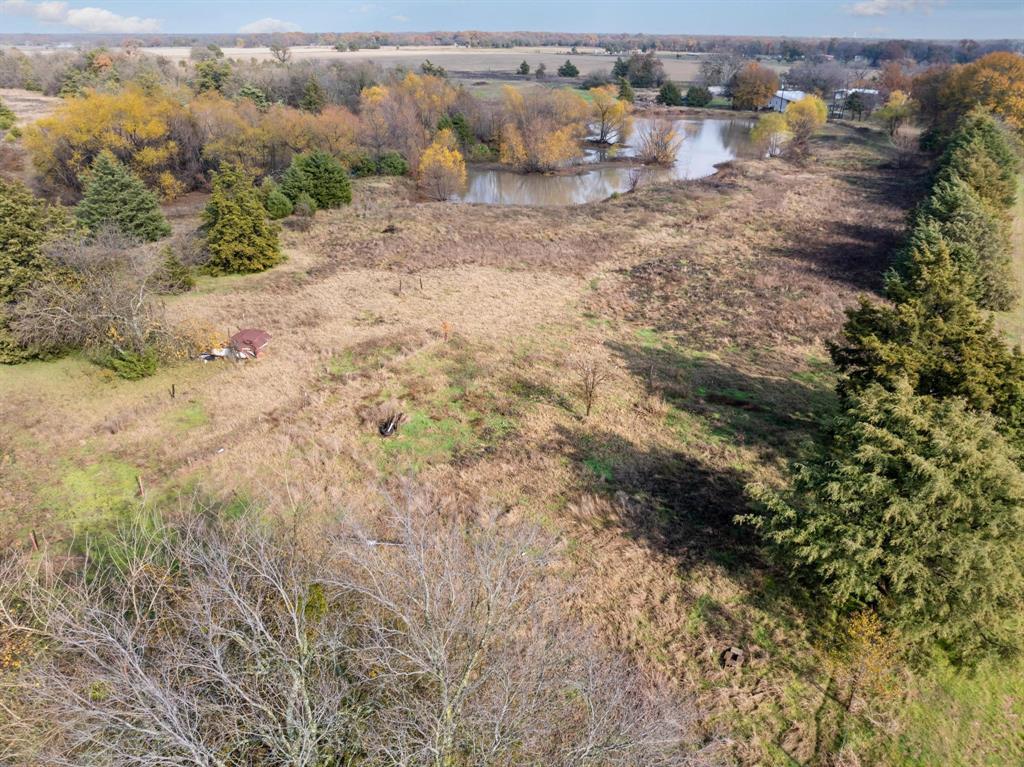 3600 East Fm 1396 Ivanhoe, TX 75447 - Photo 26 of 37 a view of a dry yard with wooden fence