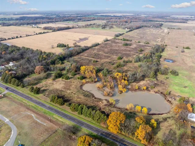 a view of a road with an ocean view