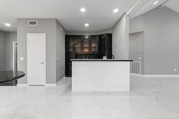 a view of a kitchen cabinets and a sink