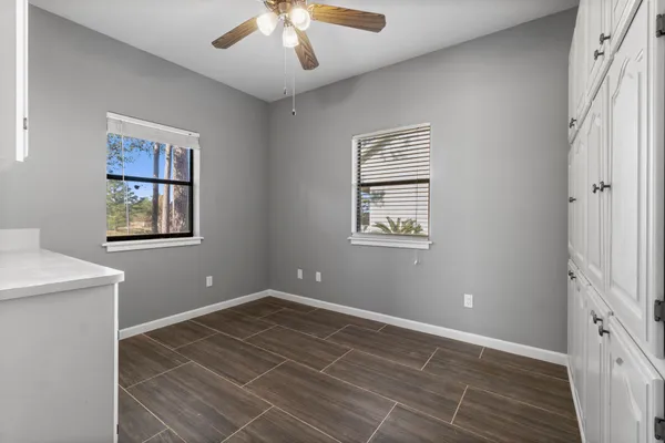 a view of an empty room with a window