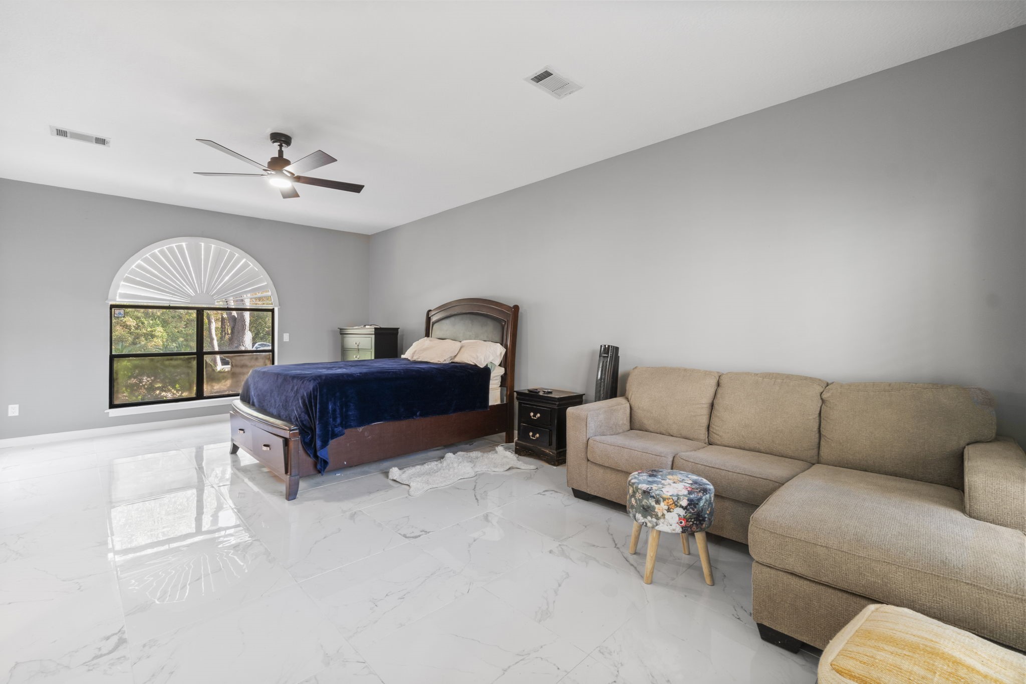 22405 Augusta Lane Point Blank, TX 77364 - Photo 22 of 50 a living room with furniture ceiling fan and a window