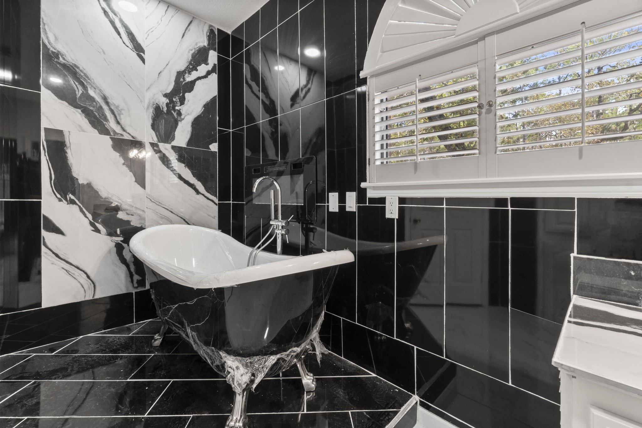 22405 Augusta Lane Point Blank, TX 77364 - Photo 26 of 50 a bathroom with a toilet a sink and mirror