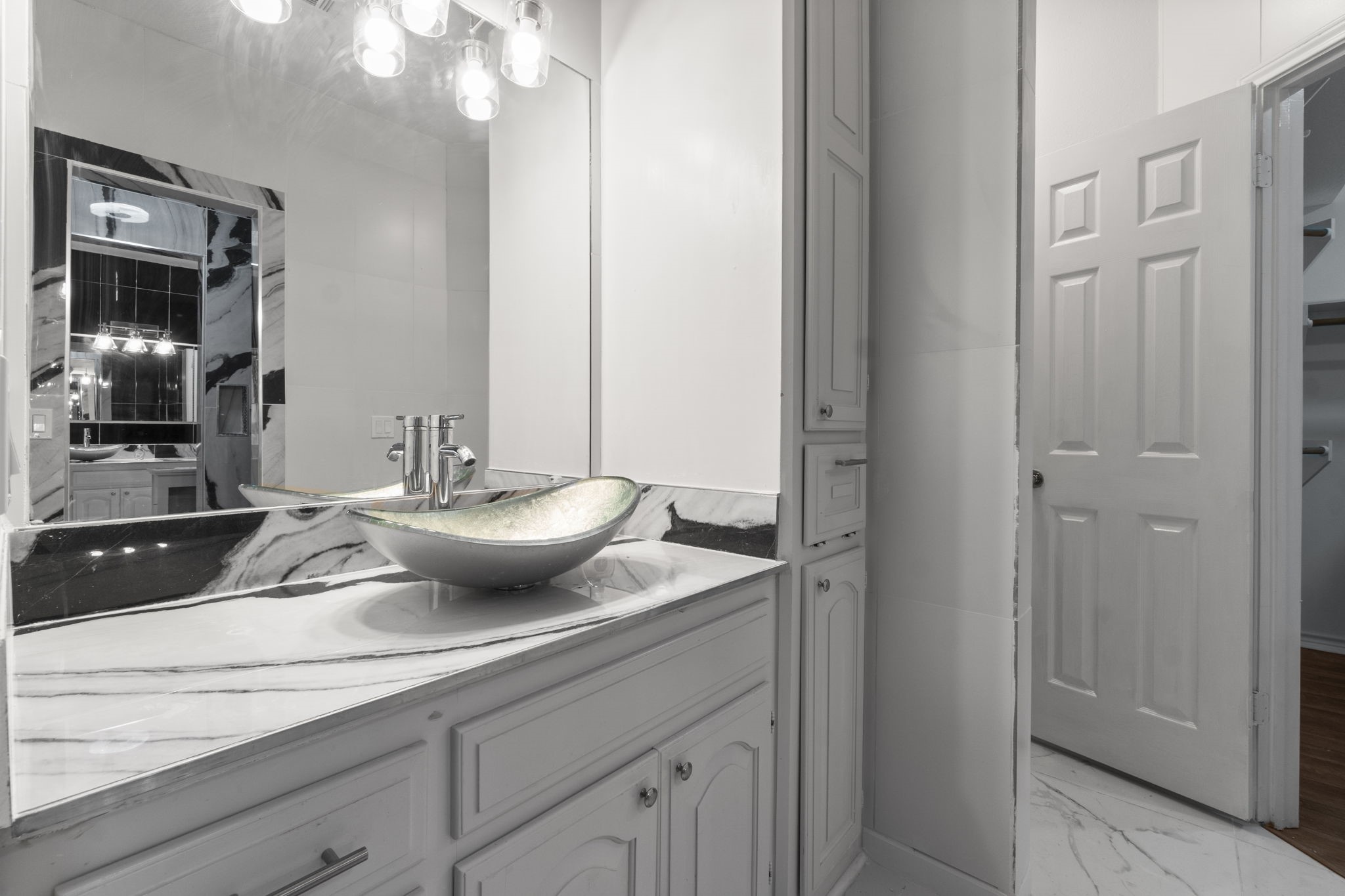 22405 Augusta Lane Point Blank, TX 77364 - Photo 28 of 50 a view of a sink and mirror