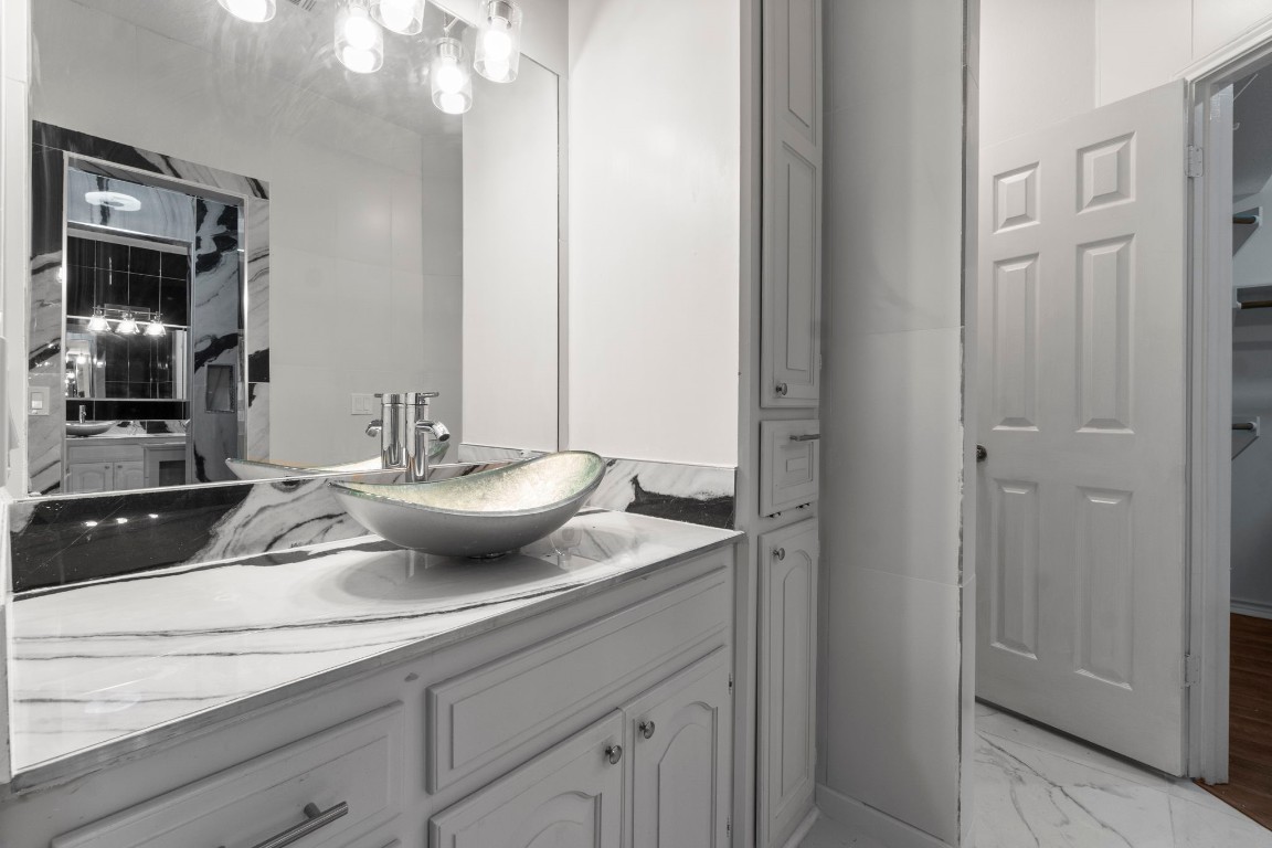 22405 Augusta Lane Point Blank, TX 77364 - Photo 28 of 50 a view of a sink and mirror