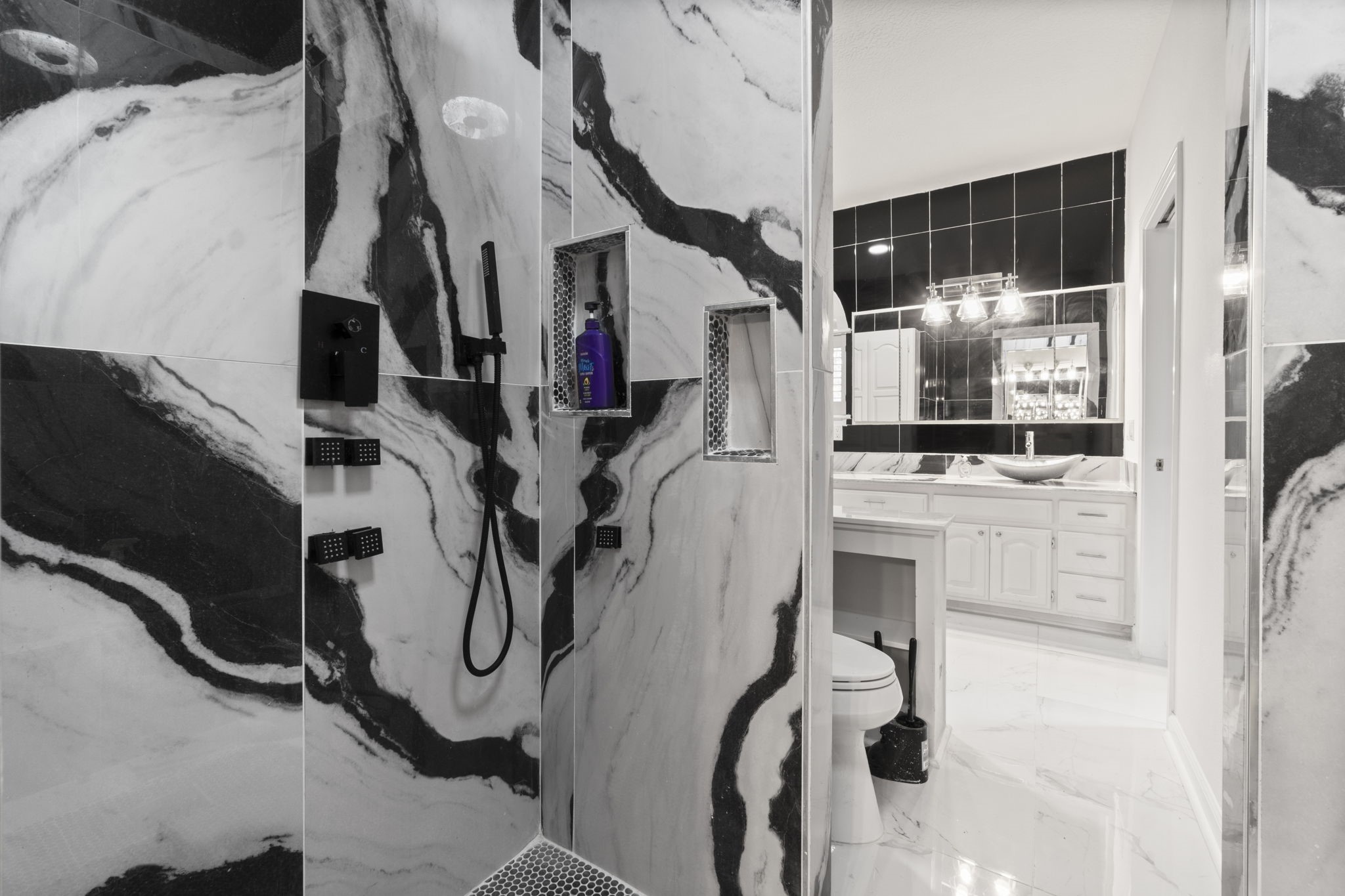 22405 Augusta Lane Point Blank, TX 77364 - Photo 29 of 50 a view of walk in closet with clothes and shoes