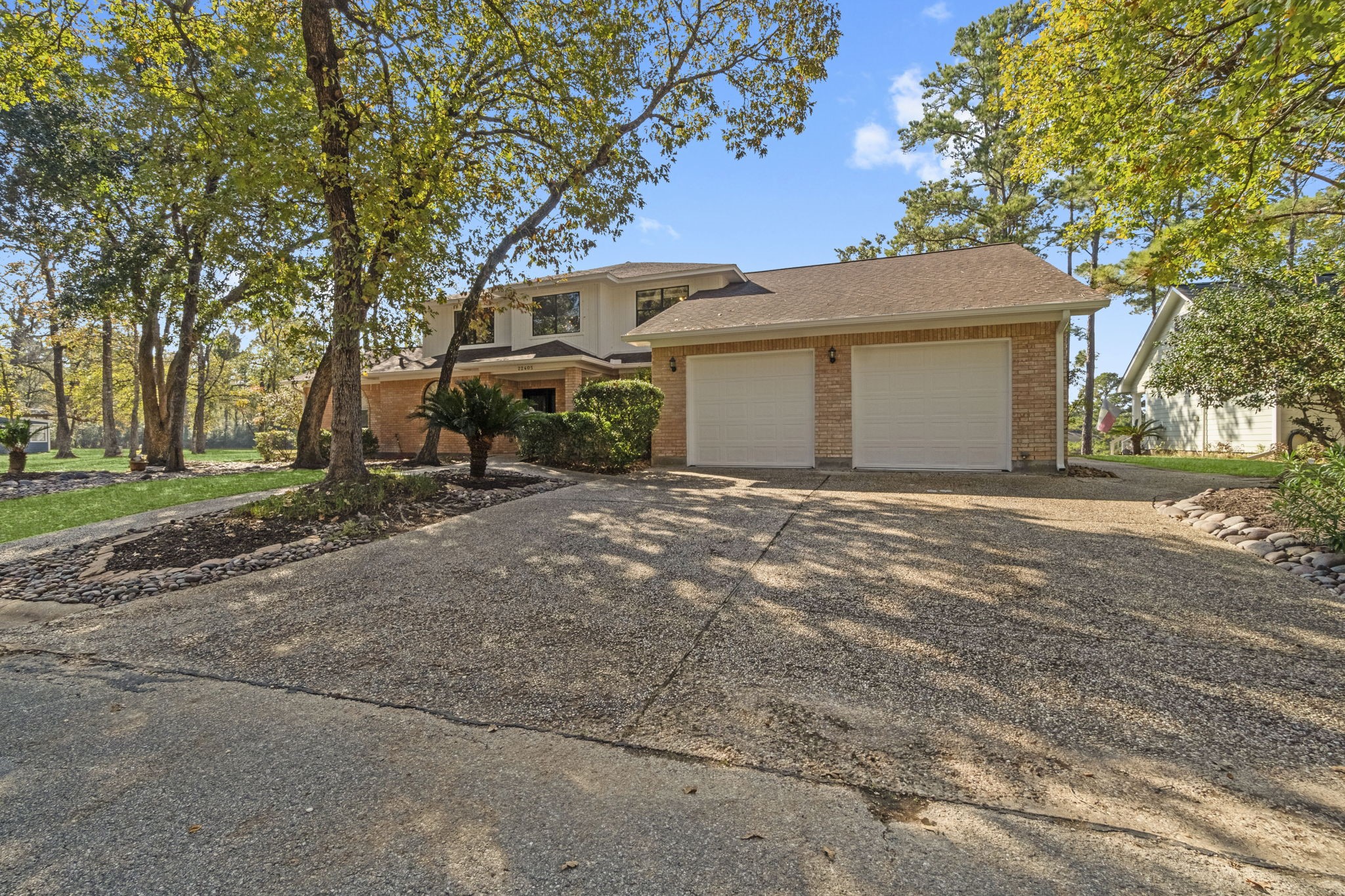 22405 Augusta Lane Point Blank, TX 77364 - Photo 3 of 50 a view of a house with a outdoor space