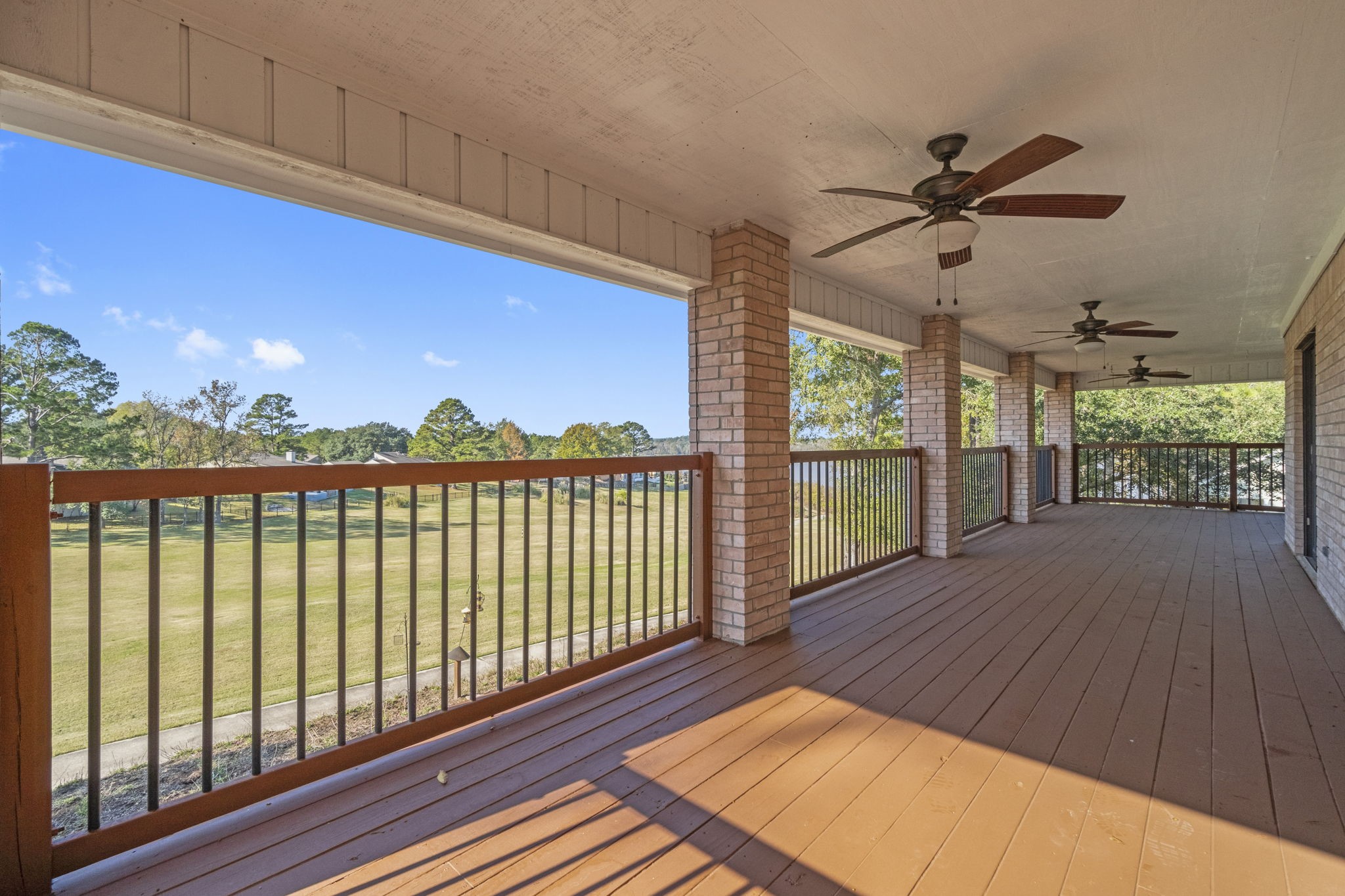 22405 Augusta Lane Point Blank, TX 77364 - Photo 35 of 50 a view of a balcony with wooden floor