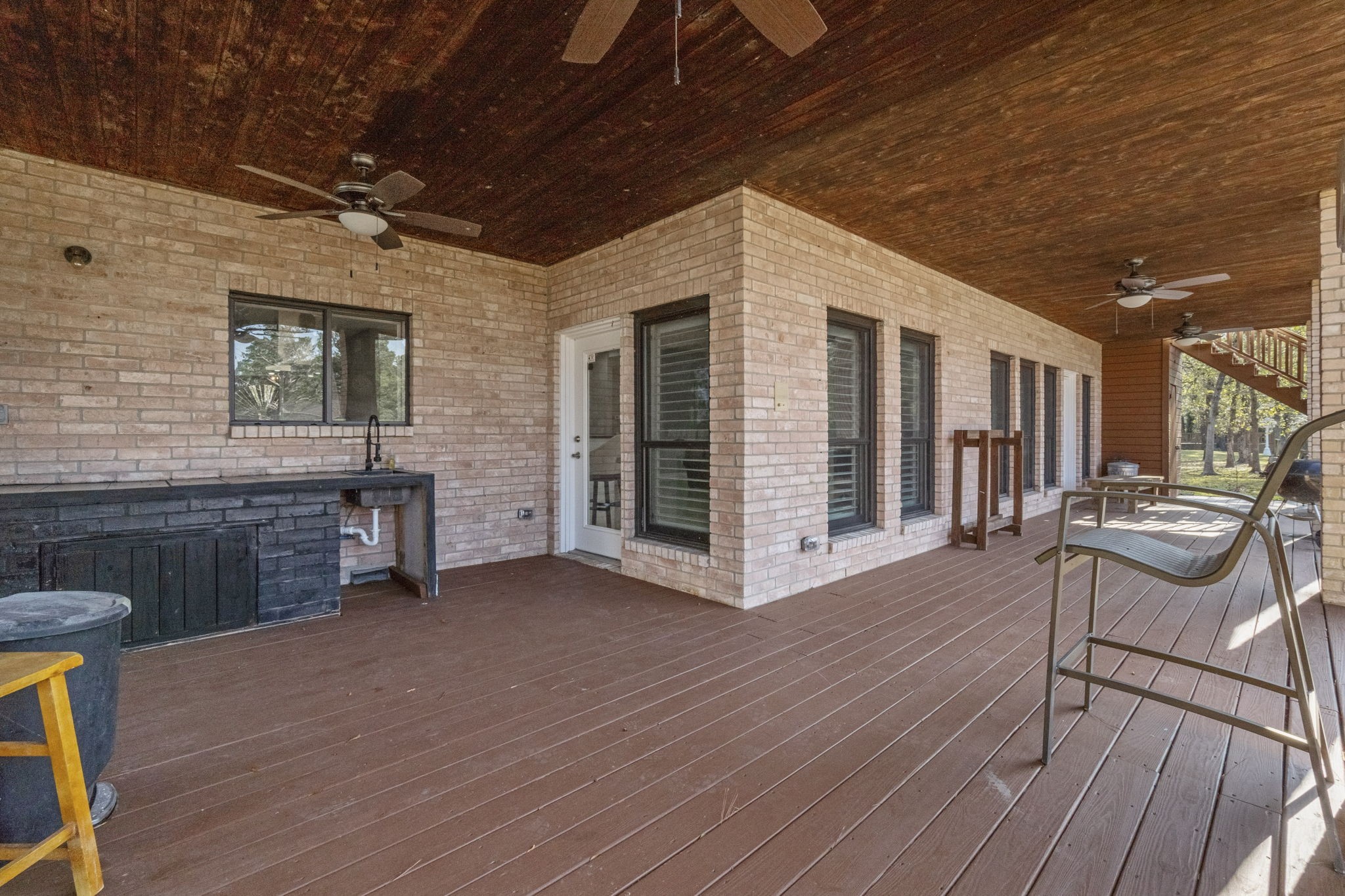 22405 Augusta Lane Point Blank, TX 77364 - Photo 38 of 50 a view of a house with lounge chair