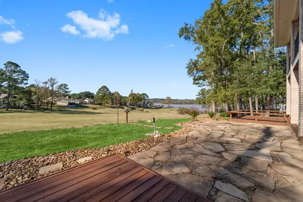 a view of a lake with a yard