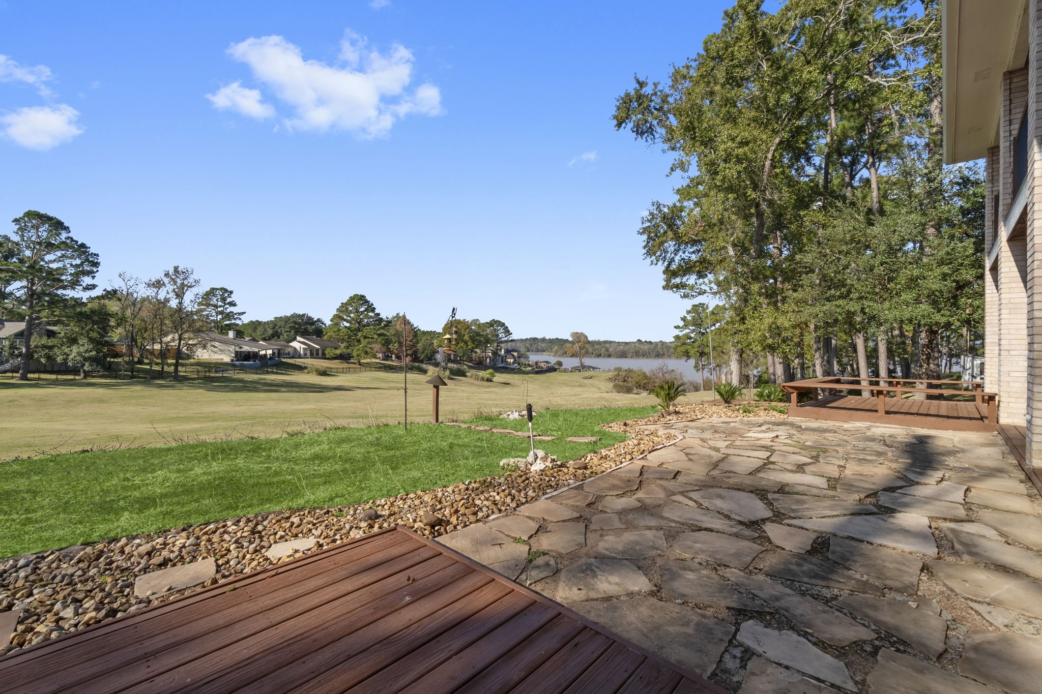 22405 Augusta Lane Point Blank, TX 77364 - Photo 40 of 50 a view of a lake with a yard