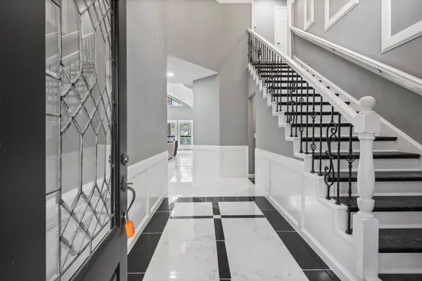 a view of entryway with wooden floor