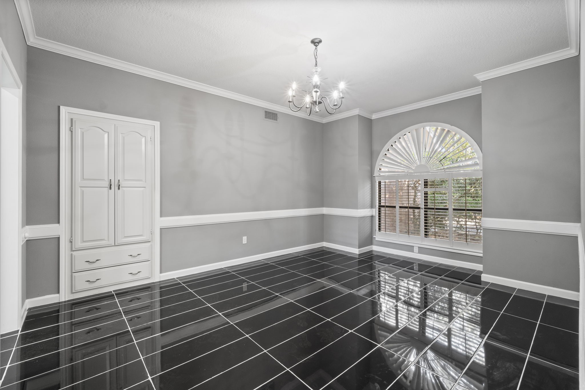 22405 Augusta Lane Point Blank, TX 77364 - Photo 7 of 50 a view of an empty room with wooden floor and a window