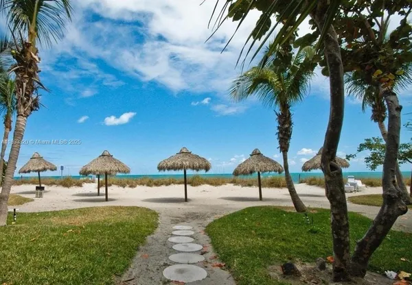 a park with water view and trees