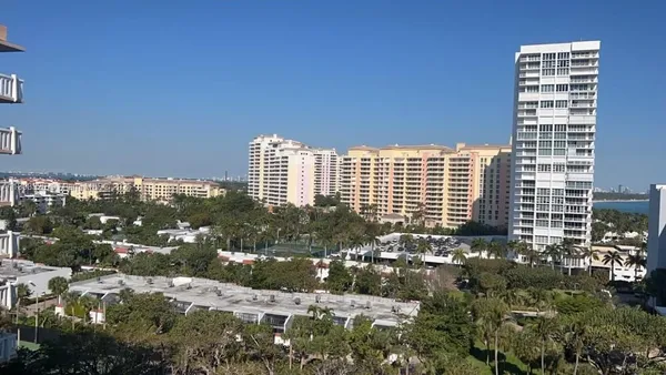 a view of a city with tall buildings