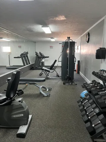 a view of a room with gym equipment