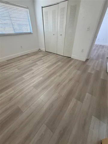 a bathroom with a sink vanity and a mirror
