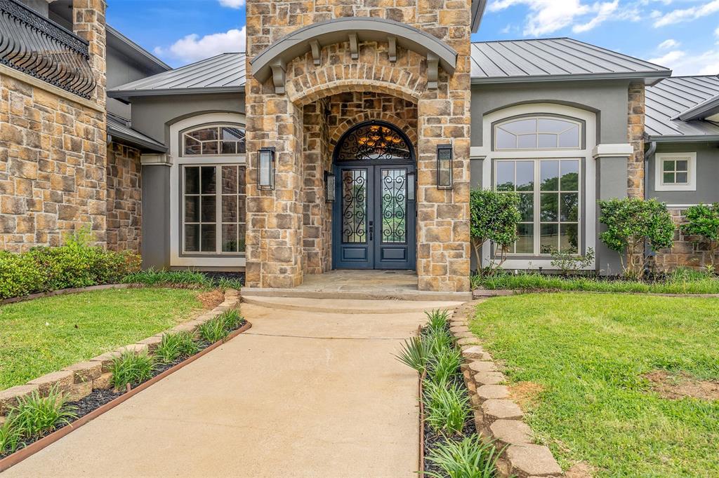 20389 County Road 178 Flint, TX 75762 - Photo 2 of 40 Stone and stucco exterior with a metal roof