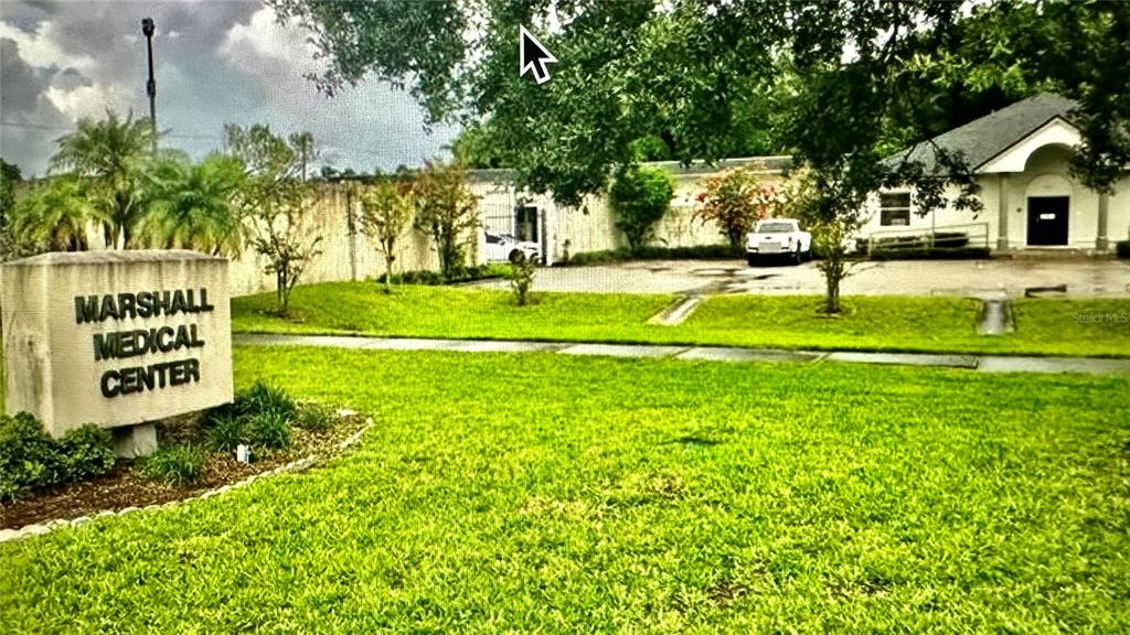 801 Marshall Farms Road Ocoee, FL 34761 - Photo 2 of 16 a building view with outdoor space