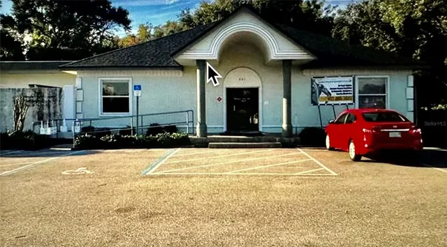 a house view with a outdoor space