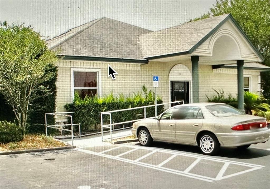801 Marshall Farms Road Ocoee, FL 34761 - Photo 5 of 16 a view of a car parked in front of house