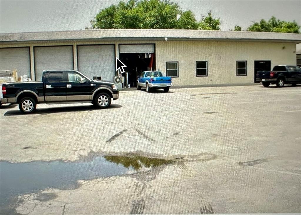 801 Marshall Farms Road Ocoee, FL 34761 - Photo 6 of 16 a view of a car parked in front of a house