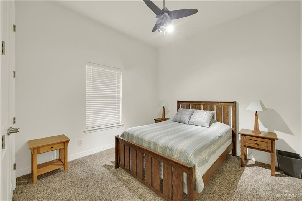 3601 North Toledo Street Pharr, TX 78577 - Photo 14 of 21 a bedroom with a bed and a window