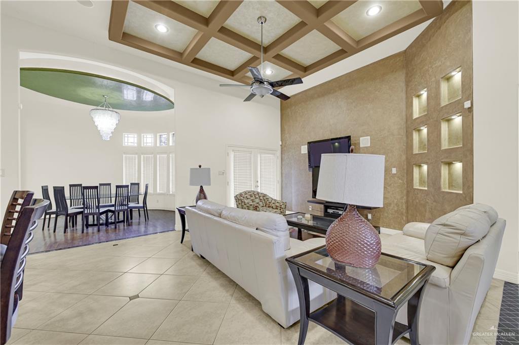 3601 North Toledo Street Pharr, TX 78577 - Photo 4 of 21 a living room with furniture a ceiling fan and a rug