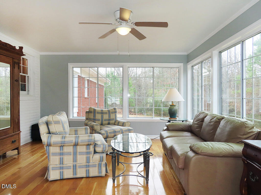 8743 Highway 751 Durham, NC 27713 - Photo 12 of 21 a living room with furniture and a large window