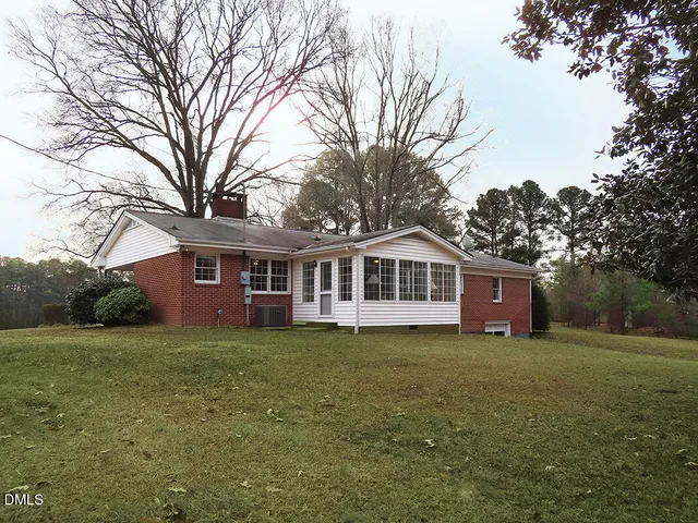a view of a house with a big yard