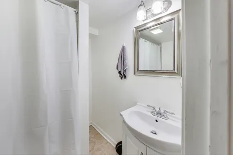 a view of a balcony with wooden floor
