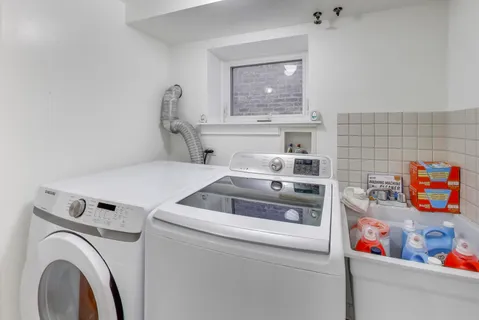 a view of a wooden deck with a yard