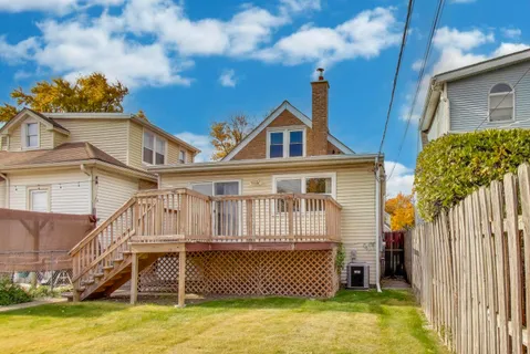 a view of a backyard of the house