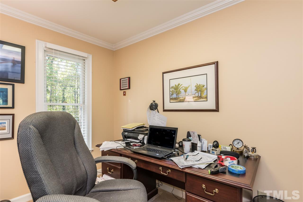 3104 Hickory Road Raleigh, NC 27616 - Photo 13 of 25 a work room with furniture and a window