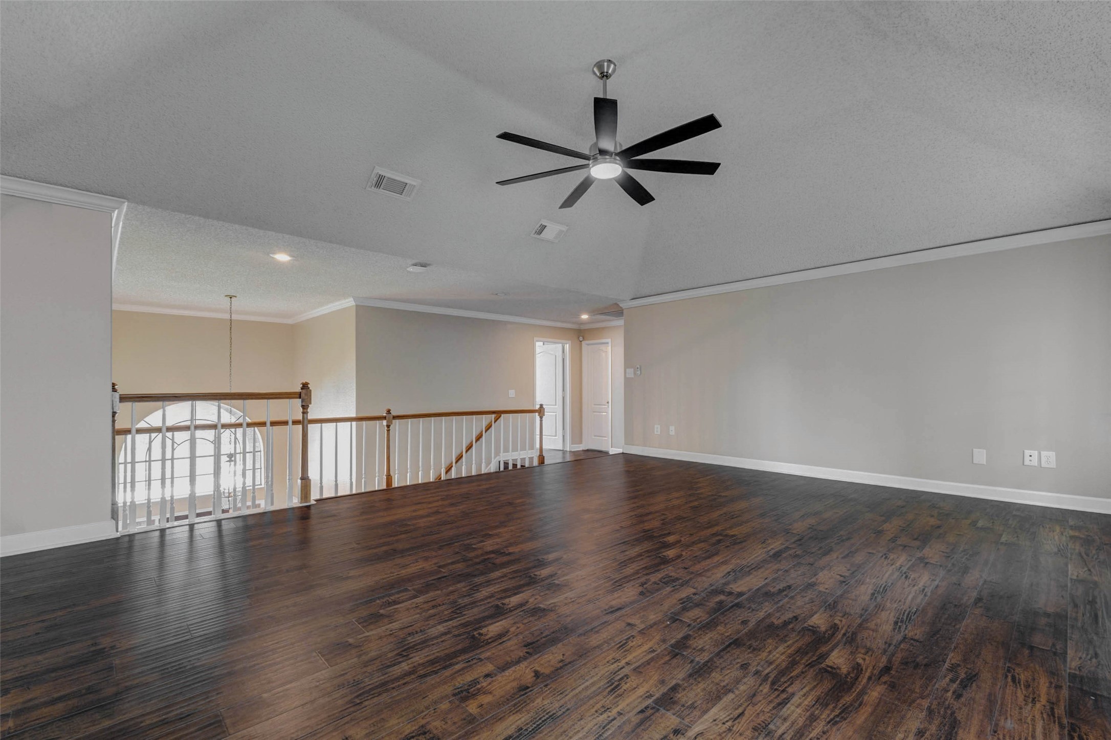 3107 Dulaney Road Houston, TX 77084 - Photo 28 of 50 a view of an empty room with wooden floor and a window